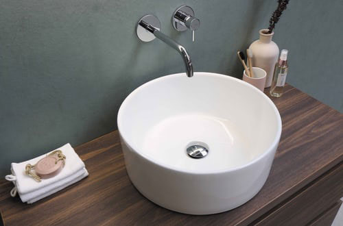 White bathroom with wide basin for two